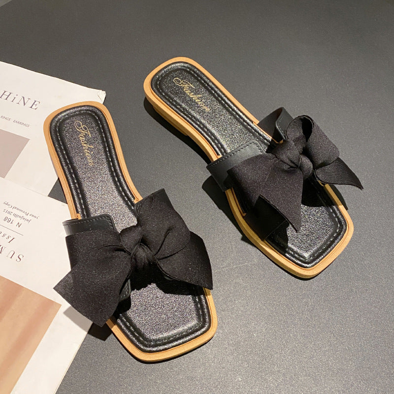 Damen Flache Sandalen aus PVC mit Schleifenverzierung | Ideal für den Sommer