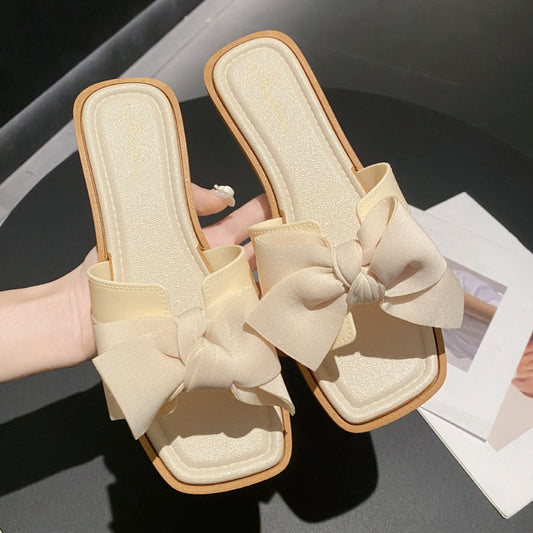 Damen Flache Sandalen aus PVC mit Schleifenverzierung | Ideal für den Sommer