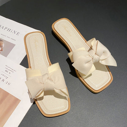 Damen Flache Sandalen aus PVC mit Schleifenverzierung | Ideal für den Sommer