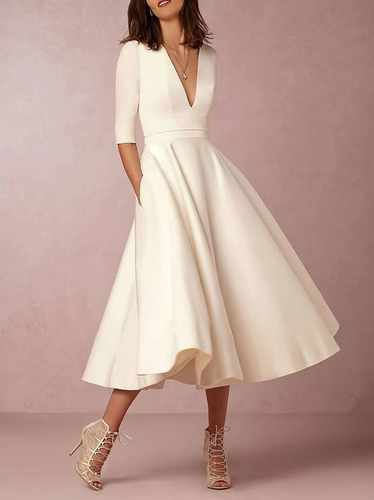 V-Ausschnitt Lockeres Kleid mit Leichtem Stoff und Fließender Silhouette | Ideal für den Sommer