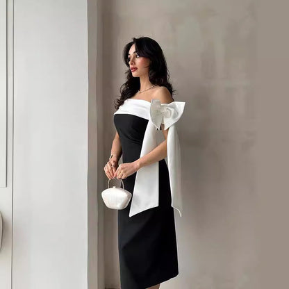 Schulterfreies Cocktailkleid mit Schleife in Schwarz-Weiß Kontrastoptik | Ideal für Abendveranstaltungen